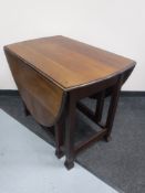 An Edwardian mahogany gateleg table