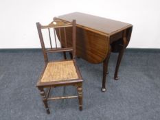 A mahogany gate leg table on club feet and a mahogany bedroom chair