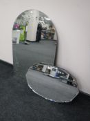 An early twentieth century framed bevelled mirror together with a domed etched mirror