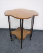 An early 20th century inlaid shaped occasional table