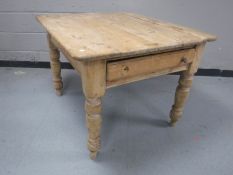 A Victorian pine farmhouse kitchen table fitted with a drawer