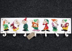 A cast iron cup rack,