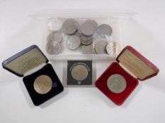 A tub of a small quantity of crowns together with a Gibraltar 80 Glorious Years £5 coin