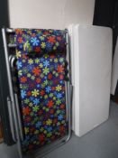 Two life time folding 4' trestle tables together with two garden loungers