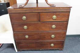 An early Victorian inlaid mahogany five drawer chest