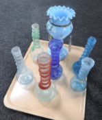 A tray of antique spiral twist glass bottles together with a part Victorian lustre