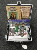 An aluminium case containing various coin covers, Churchill, Royalty,