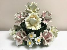 A Capo Di Monte ceramic model : Large spray of eleven roses and two dandelions, height 18 cm.