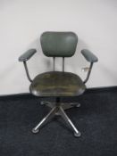 An Evertaut swivel adjustable armchair