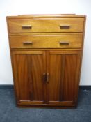 A 20th century mahogany linen cupboard