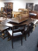 A Regency style dining table with leaf and four chairs