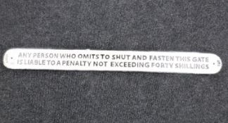 A 3 foot cast iron railway safety plaque