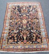 An antique Persian Faraghan rug,