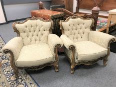 A pair of continental style walnut salon chairs upholstered in two-tone green silk (2)