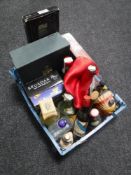 A box containing assorted bottles of alcohol and alcohol gift sets
