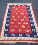 A Moroccan kilim rug 244 cm x 166 cm