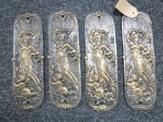 Four cast iron finger plates