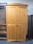 A pine double door wardrobe