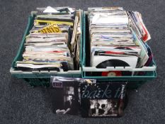 Two boxes containing vinyl 45 singles,