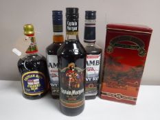 Five bottles of alcohol; 750ml British Navy Pusser's Rum, two 70cl bottles of Lamb's Navy Rum,