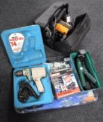 A collection of tools including Wolf drill etc.