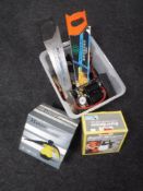 A box of hand tools, foot pump together with a boxed steam cleaner,