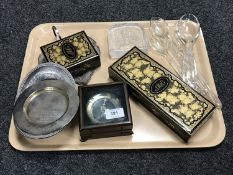 An Indian white metal leaf dish, two items of silver plate, two lacquered trinket boxes,