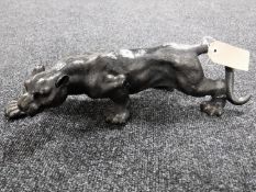 A cast iron lioness figure