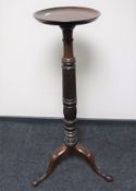 A Victorian mahogany torchere