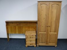 A pine double door wardrobe,