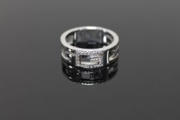 An 18ct gold diamond set ring by Gucci, 10.