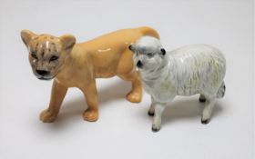 A Beswick china figure - Lion cub, facing left, model 2098, height 10 cm,