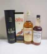 Four bottles of alcohol; 70cl Southern Comfort, 70cl Famous Grouse,