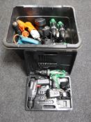 A plastic crate of five battery drills, Black and Decker planer,