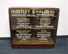 A mid 20th century and later glazed bookcase with 