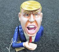 A cast iron Donald Trump money bank
