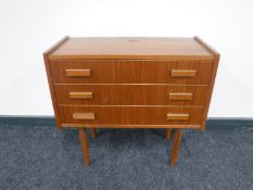 A Danish teak three drawer chest