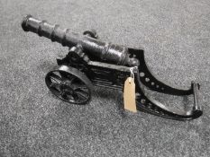 A cast iron model cannon,
