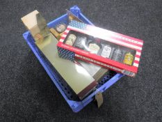 A basket containing assorted whisky miniatures and gift sets
