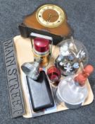 A tray of walnut cased mantel clock, vintage Pifco lamp,