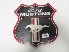 A cast iron Ford Mustang plaque