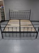 A 6' contemporary metal bed frame