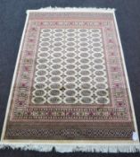 A Bokhara rug 190 cm x 140 cm on beige ground