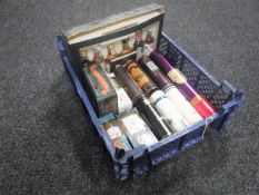 A basket containing assorted whisky miniatures and gift sets