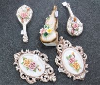 A pair of Capo Di Monte ceramic oval-shaped rose wall plaques, height 32 cm,
