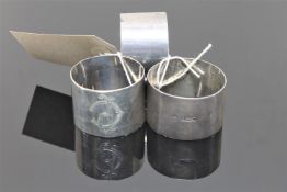Three silver heavy gauge napkin rings (3)