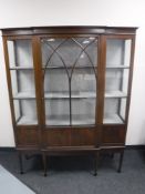 An Edwardian inlaid mahogany breakfront display cabinet
