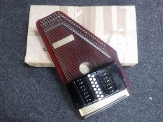 A boxed Autoharp