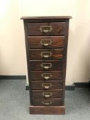 An oak and pine eight drawer index chest,