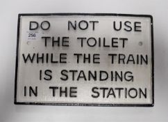 A cast iron toilet sign CONDITION REPORT: 19cm by 28cm.